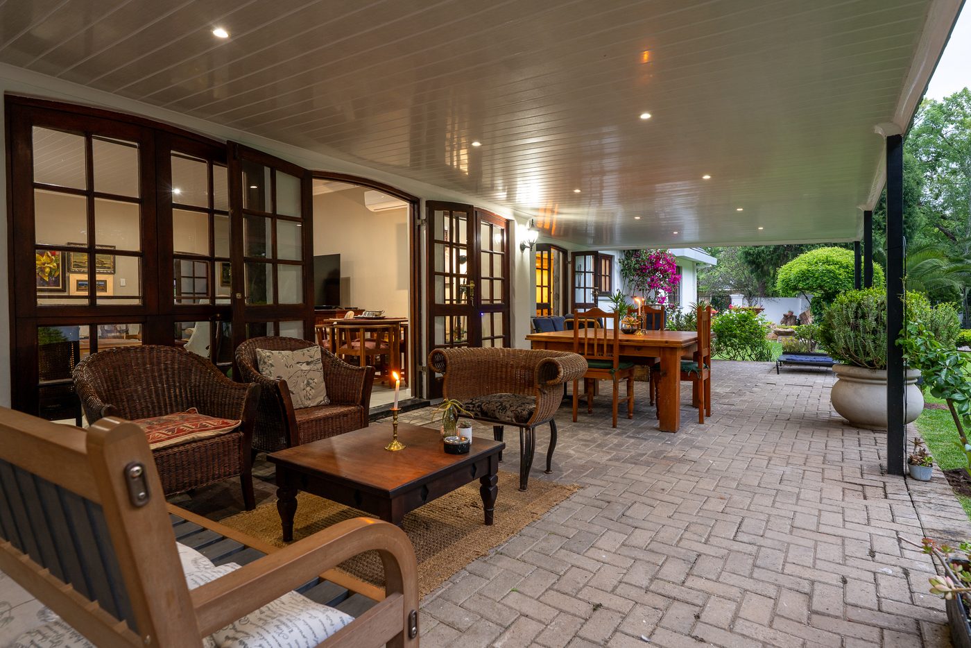 Covered veranda with guest seating at 91Waverley Guesthouse, Bloemfontein